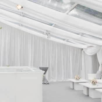 White wedding bar inside marquee